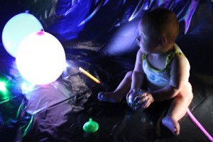 baby with balloons