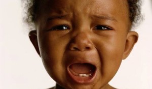 black baby crying
